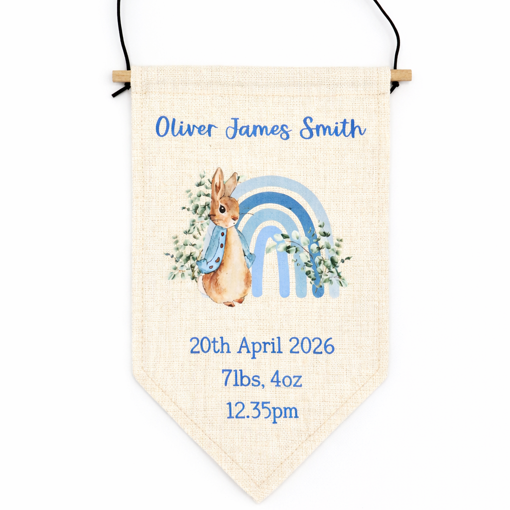 Personalized baby banner with rabbit illustration, rainbow, and text on a white background