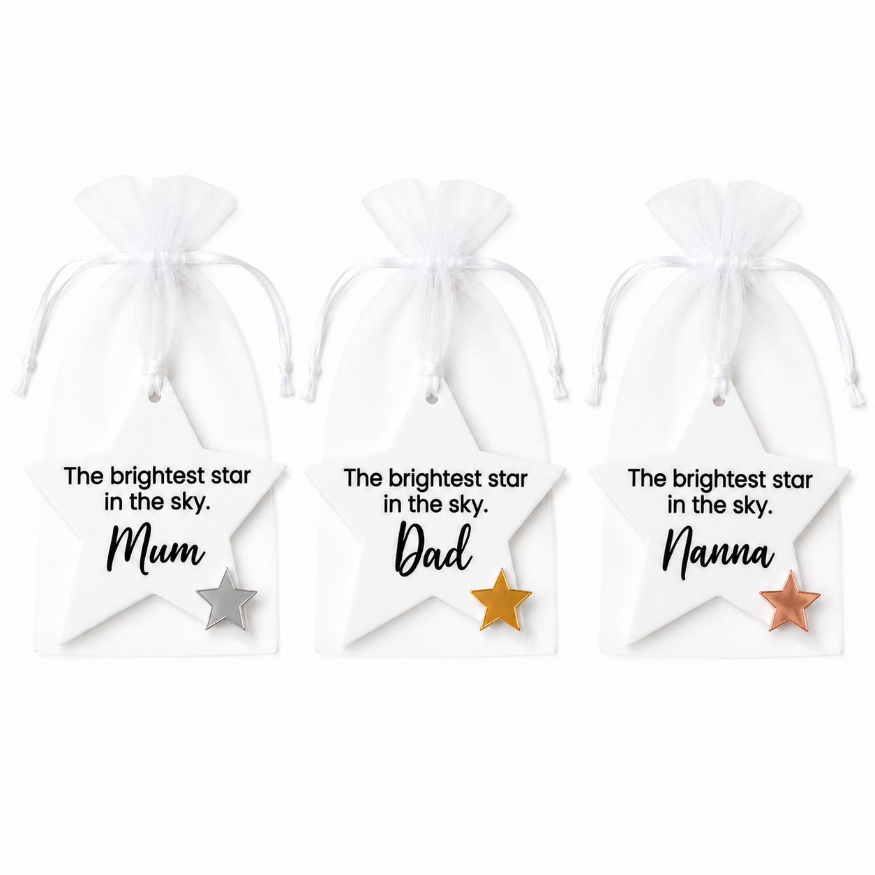 Three white drawstring bags with stars and personalized text on a white background