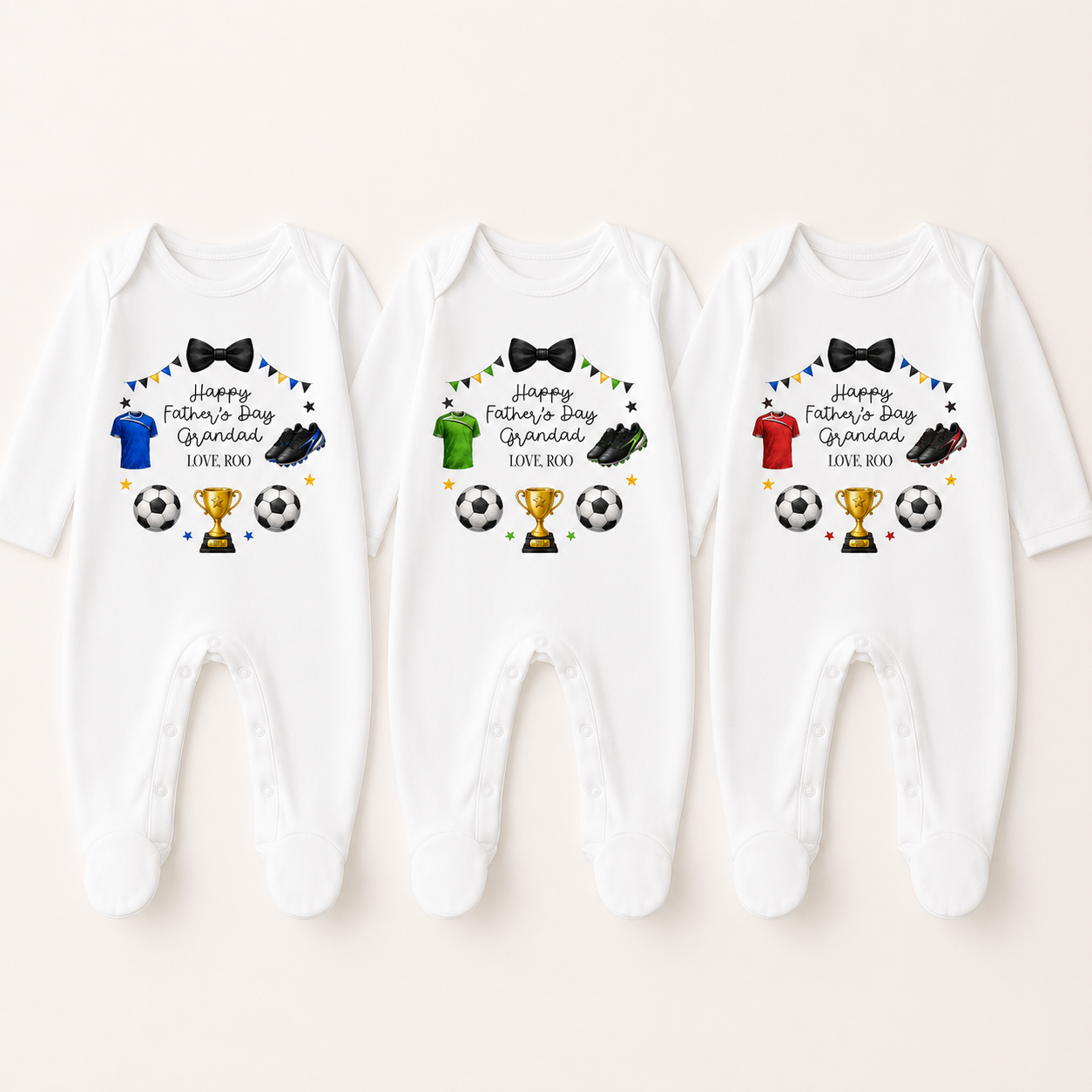 Three white baby rompers with Father's Day-themed graphics on a white background