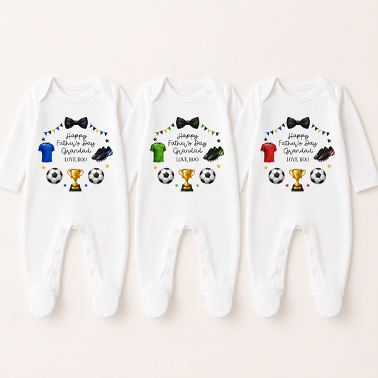 Three white baby rompers with Father's Day-themed graphics on a white background