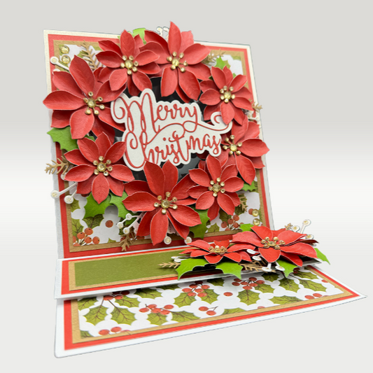 Christmas card with red poinsettias and 'Merry Christmas' text on a white background
