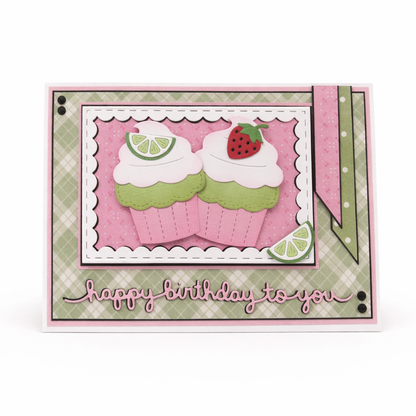 Birthday card with cupcake design, strawberry, and lime on a checkered background