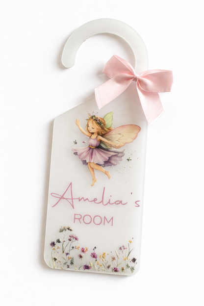 Decorative door hanger with fairy design and 'Amelia's Room' text on a white background