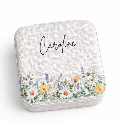 Jewelry box with floral design and 'Caroline' text on a white background