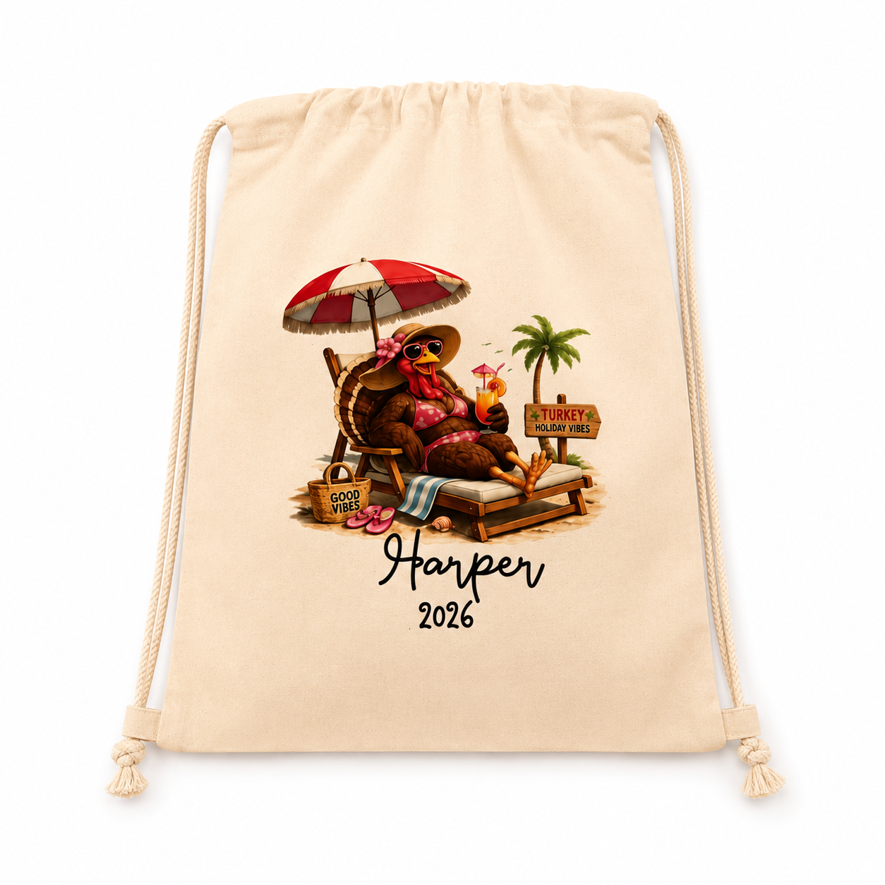 A beige drawstring bag with a custom beach-themed graphic of a relaxing bear under a red and white umbrella, with the text 'Harper 2026' printed below, shown on a clean white background.