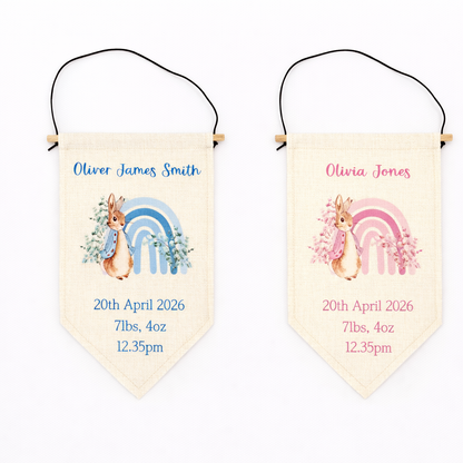 Two baby announcement banners with deer and rainbow designs on a white background.