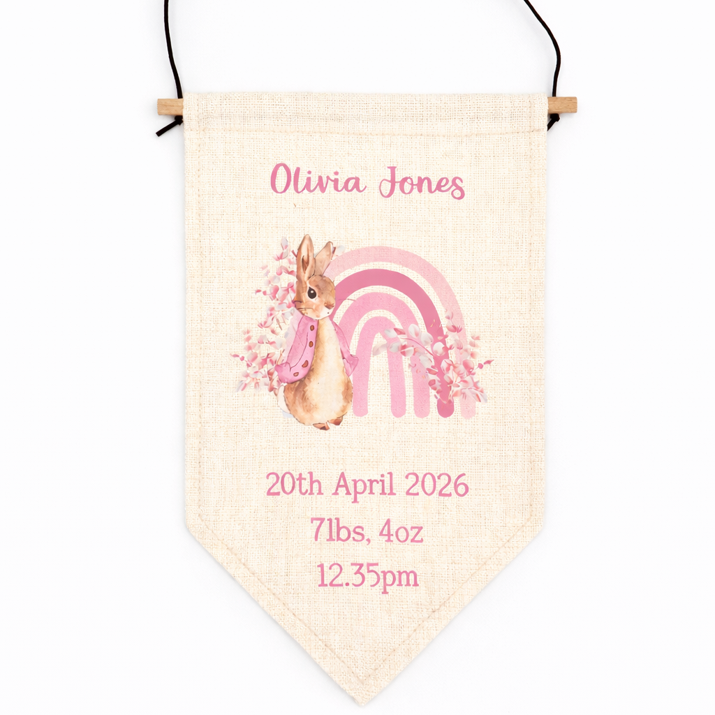 Personalized baby banner with rabbit and rainbow design on a white background