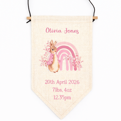 Personalized baby banner with rabbit and rainbow design on a white background