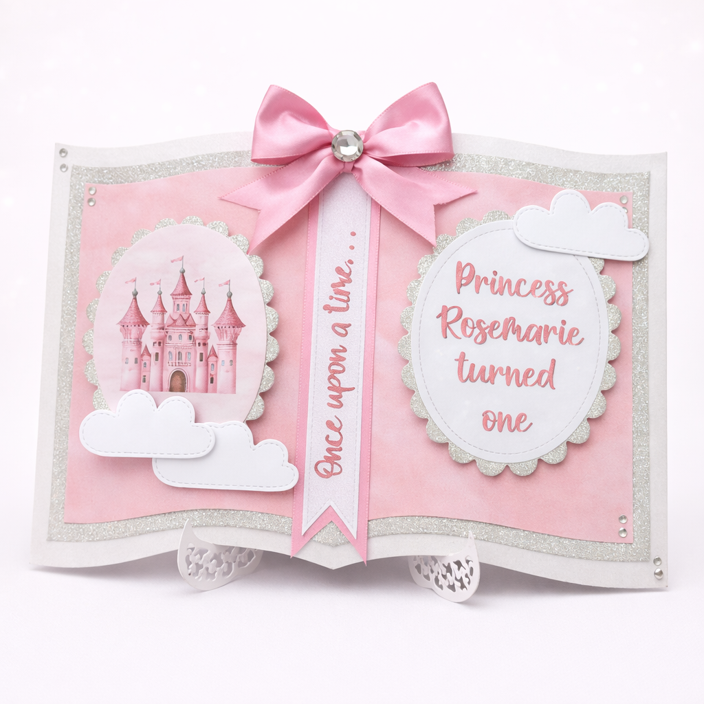 Decorative book with pink ribbon, castle illustration, and text on a white background