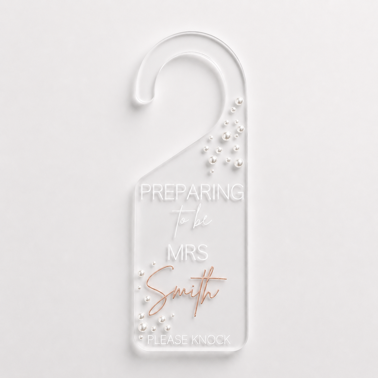 Door hanger with 'Preparing to be Mrs Smith' text on a white background