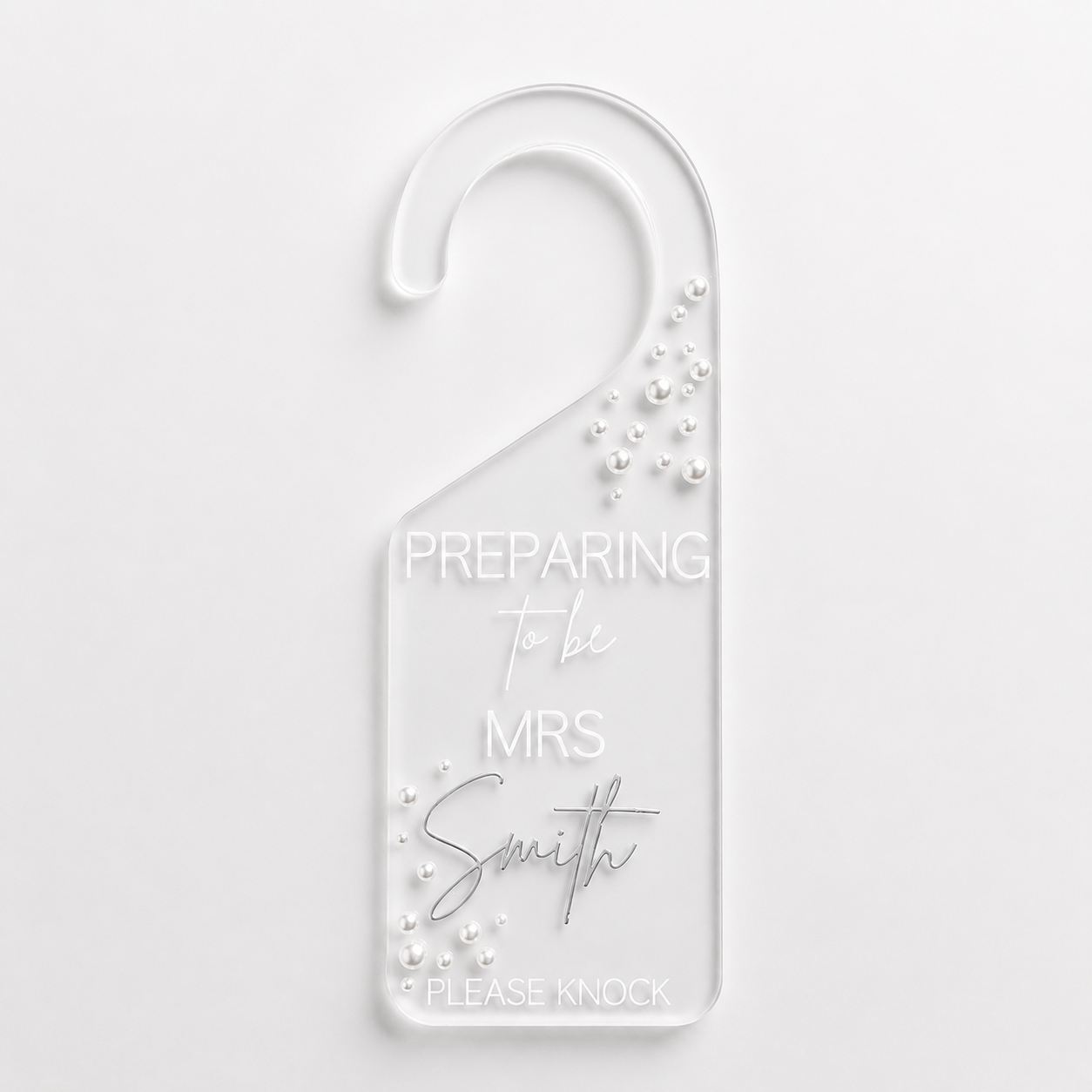 Door hanger with 'Preparing To Be Mrs Smith' text on a white background