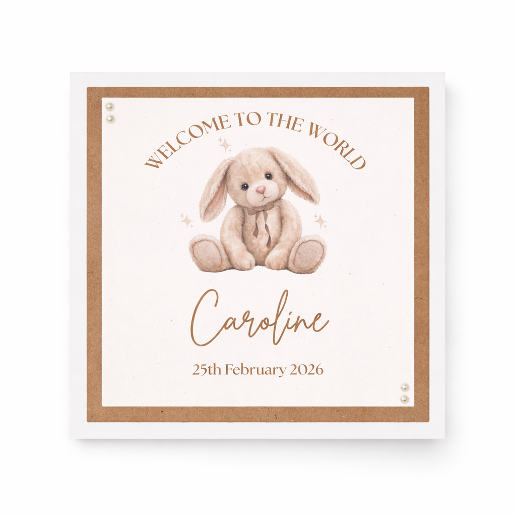 Newborn baby announcement card with a bunny illustration and text on a white background